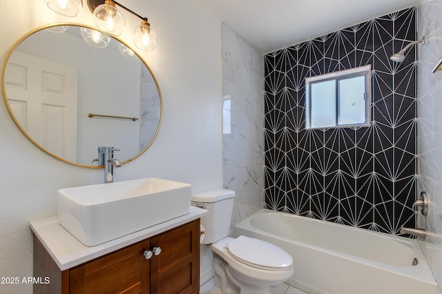 full bath with toilet, vanity, and bathtub / shower combination