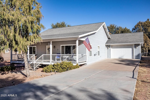 view of front facade with a porch and a garage