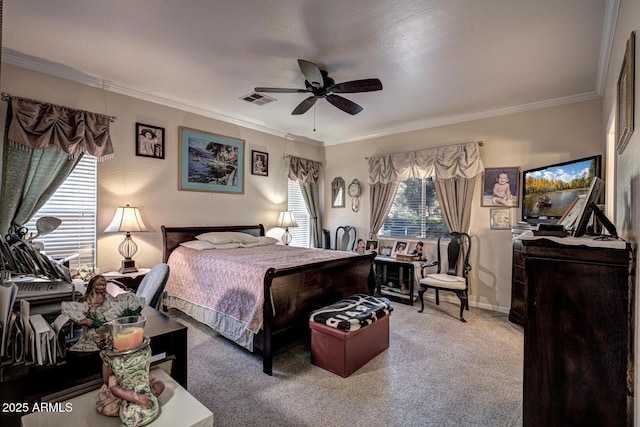 bedroom with ceiling fan, carpet, and ornamental molding