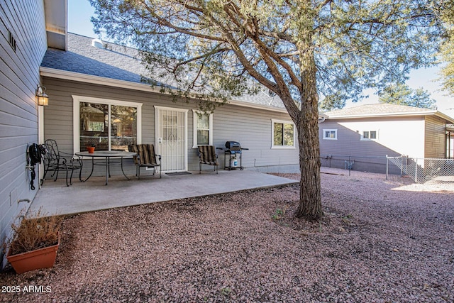 back of property featuring a patio area