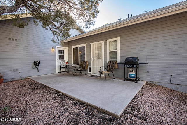 view of patio with a grill