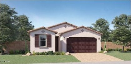 23334 W Mobile Ln, Buckeye, AZ 85326 - mediterranean / spanish home featuring an attached garage, driveway, and stucco siding