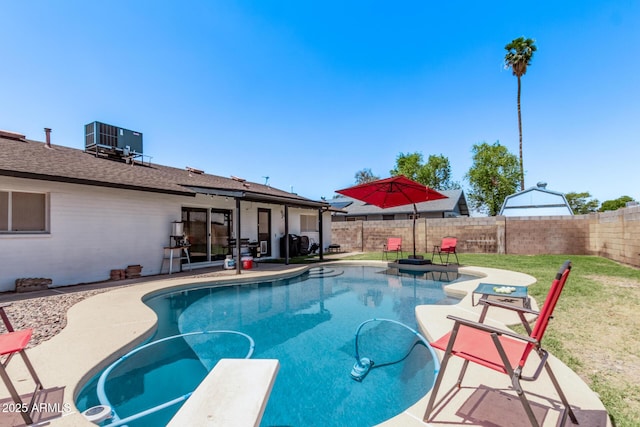 5226 W Redfield Rd, Glendale, AZ 85306 - view of pool with cooling unit, a patio area, and a diving board