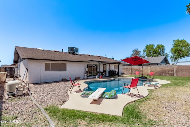 5226 W Redfield Rd, Glendale, AZ 85306 - back of house with a patio area, a fenced backyard, and central AC