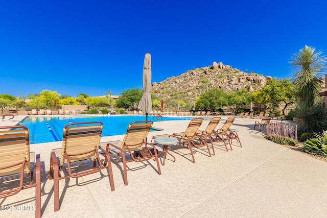 community pool with a patio