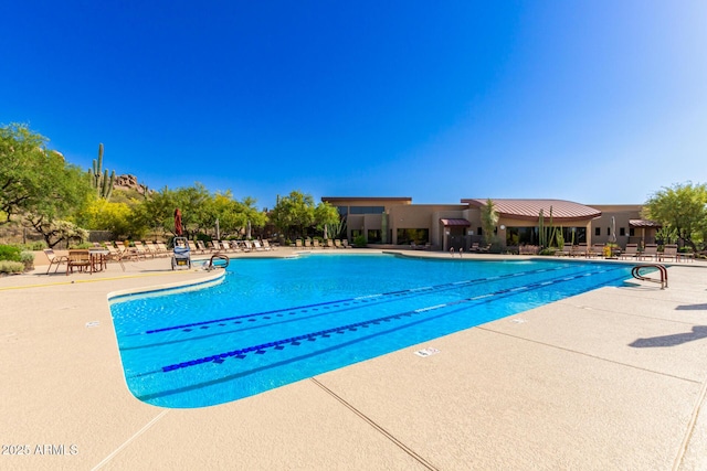 community pool featuring a patio