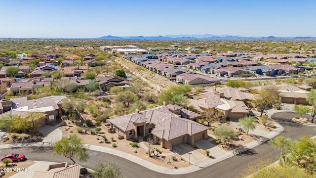 aerial view featuring a mountain view and a residential view