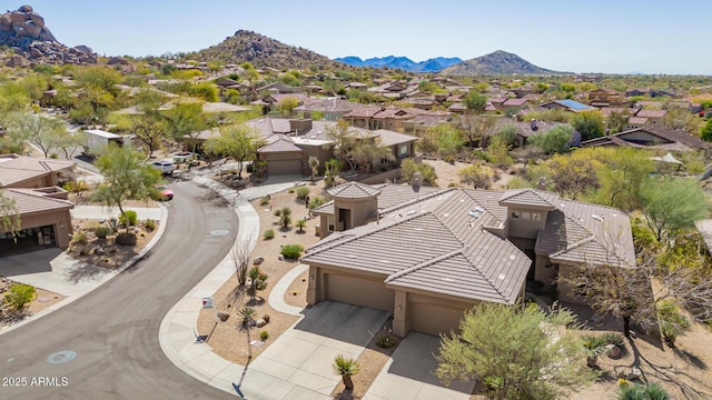 aerial view with a mountain view and a residential view