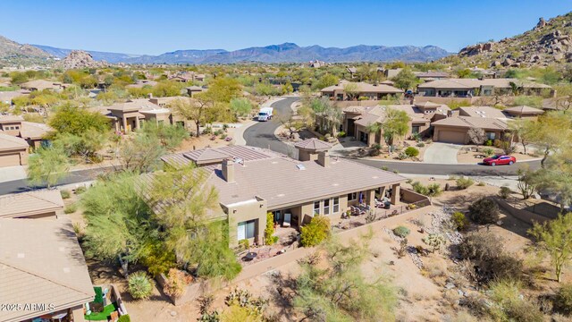 aerial view with a mountain view and a residential view