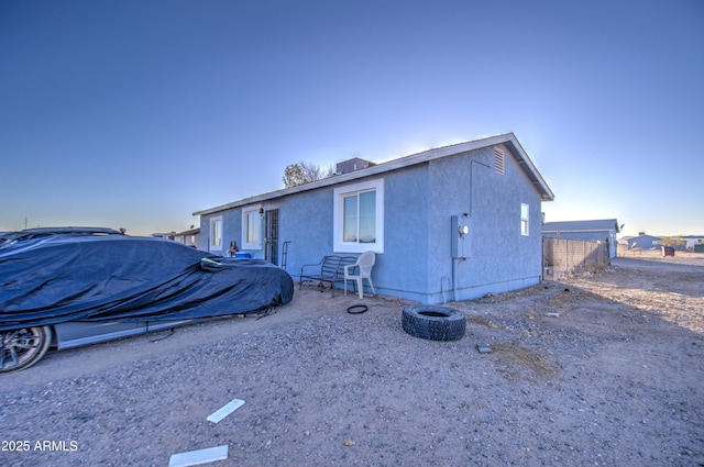 view of front of house with stucco siding