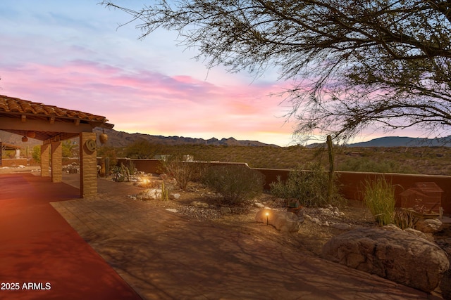 view of patio / terrace with a mountain view