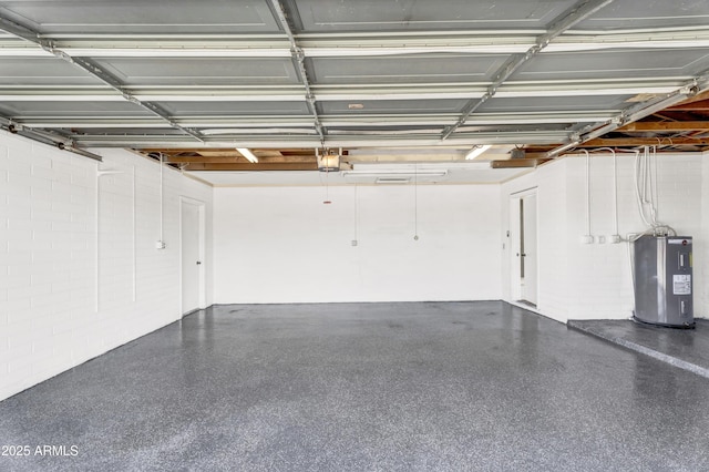 garage featuring electric water heater