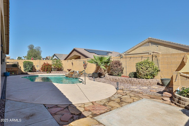 view of pool with a patio area, a fenced backyard, and a fenced in pool