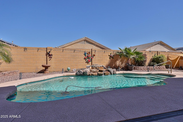 view of swimming pool featuring a fenced backyard, a fenced in pool, and a patio