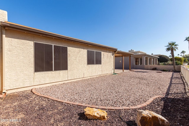 rear view of property with a patio area