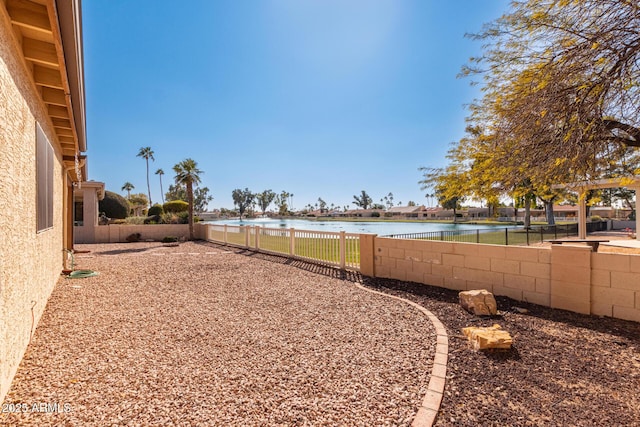 view of yard with a water view