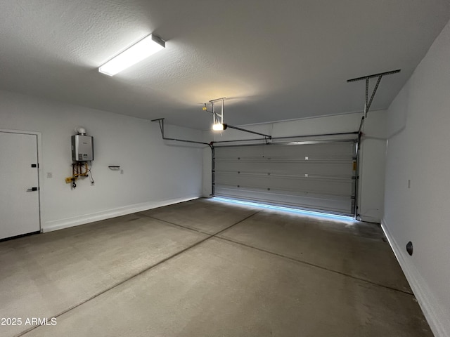 garage with tankless water heater and a garage door opener