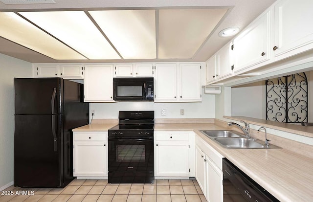 205 N 74th St Unit 248, Mesa, AZ 85207 - kitchen featuring black appliances, a sink, light countertops, and white cabinets