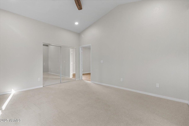 1736 E Bluefield Ave, Phoenix, AZ 85022 - unfurnished bedroom featuring light carpet, a closet, ceiling fan, high vaulted ceiling, and recessed lighting