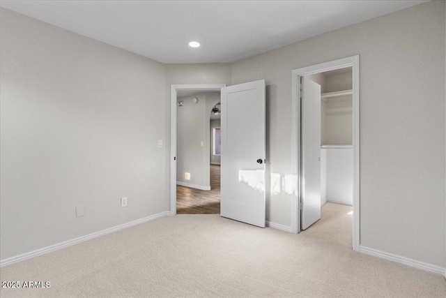 1736 E Bluefield Ave, Phoenix, AZ 85022 - unfurnished bedroom featuring carpet floors, a spacious closet, and recessed lighting