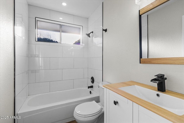 1736 E Bluefield Ave, Phoenix, AZ 85022 - bathroom with vanity, shower / tub combination, and a textured wall