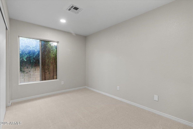 1736 E Bluefield Ave, Phoenix, AZ 85022 - unfurnished room featuring light colored carpet and recessed lighting