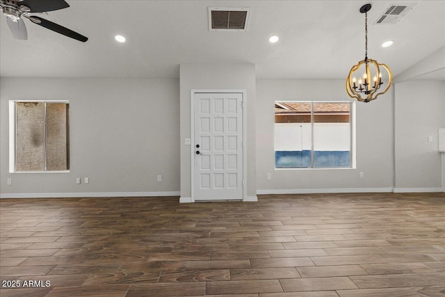 1736 E Bluefield Ave, Phoenix, AZ 85022 - unfurnished room featuring ceiling fan, a chandelier, dark wood-style floors, and recessed lighting
