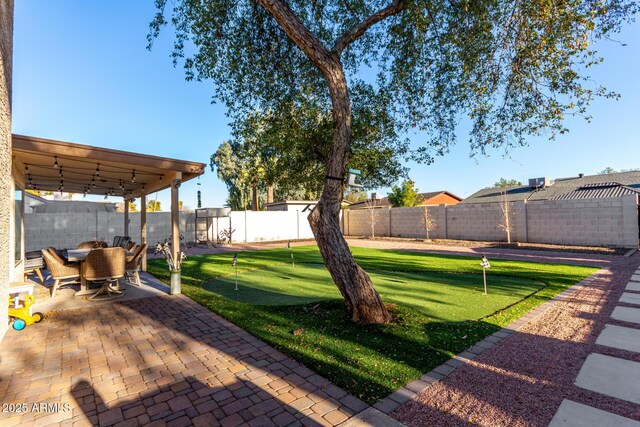 view of yard featuring a pergola and a patio