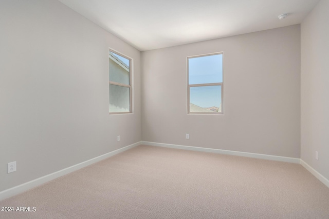 empty room with carpet flooring