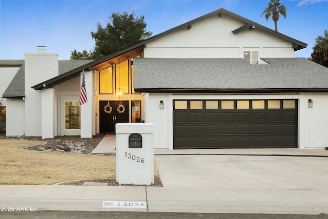 view of front of house with a garage