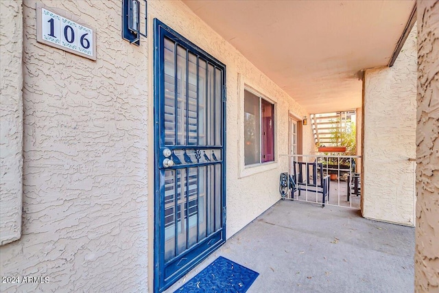 7502 E Carefree Dr Unit 106, Carefree, AZ 85377 - doorway to property with stucco siding