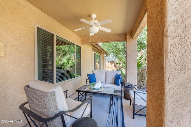 view of patio with outdoor lounge area and a ceiling fan