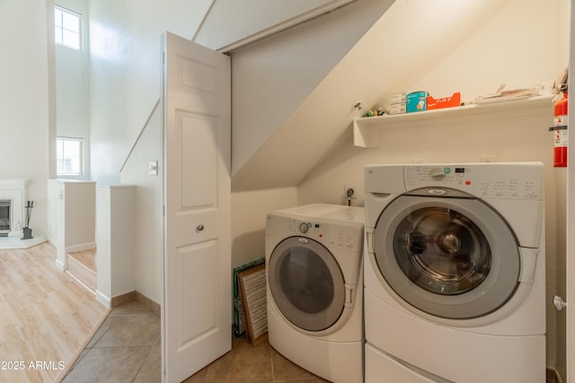 laundry room featuring independent washer and dryer and laundry area