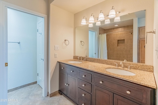 bathroom featuring tile patterned flooring, a sink, a shower with shower curtain, and double vanity