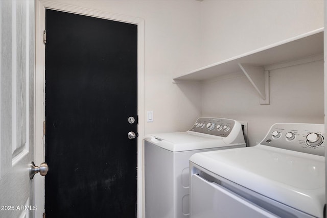 washroom with laundry area and separate washer and dryer