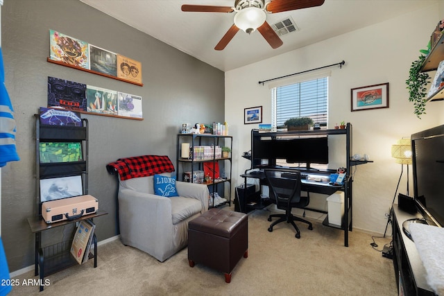 home office with baseboards, visible vents, and light colored carpet