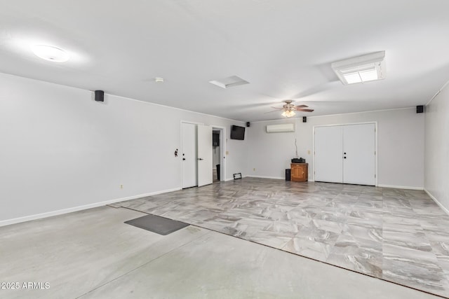 unfurnished room featuring ceiling fan and a wall mounted AC