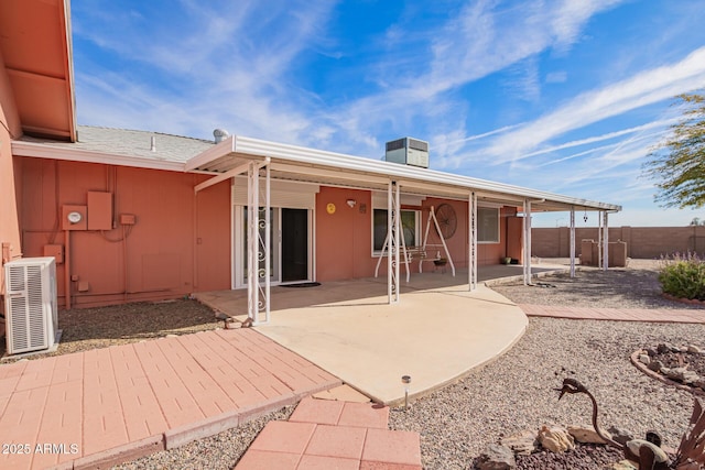 back of property featuring a patio