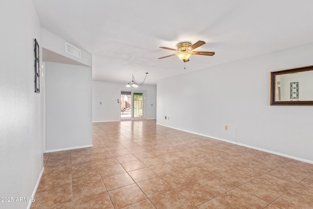 unfurnished room with light tile patterned flooring and ceiling fan