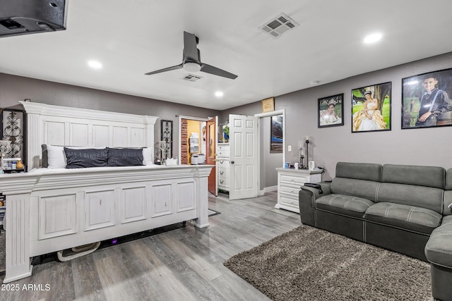 3207 N Steves Blvd, Flagstaff, AZ 86004 - bedroom with ceiling fan, wood finished floors, visible vents, and recessed lighting