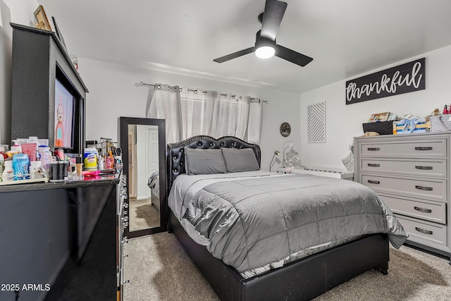 3207 N Steves Blvd, Flagstaff, AZ 86004 - bedroom with a ceiling fan and light colored carpet