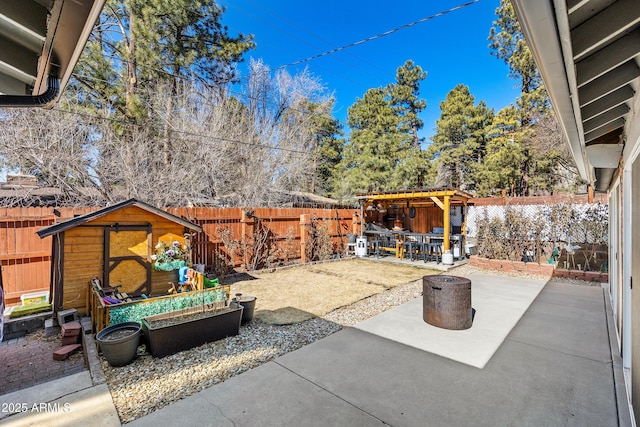 3207 N Steves Blvd, Flagstaff, AZ 86004 - view of patio / terrace with a fenced backyard and an outdoor structure