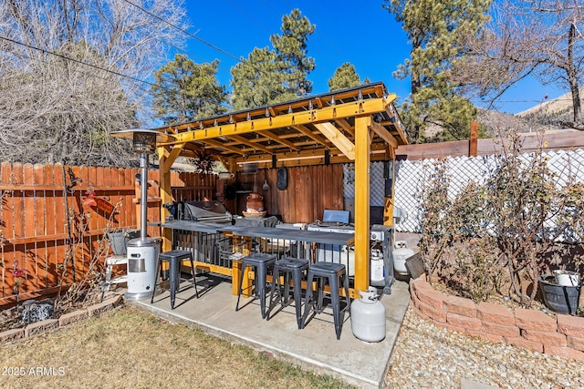 3207 N Steves Blvd, Flagstaff, AZ 86004 - view of patio featuring outdoor dry bar and fence
