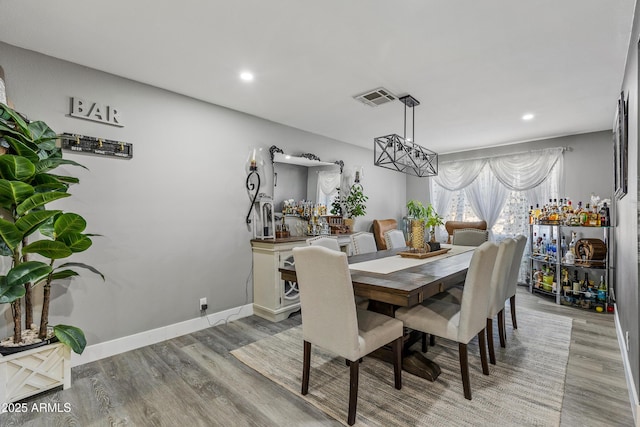 3207 N Steves Blvd, Flagstaff, AZ 86004 - dining space featuring light wood-type flooring, baseboards, visible vents, and recessed lighting