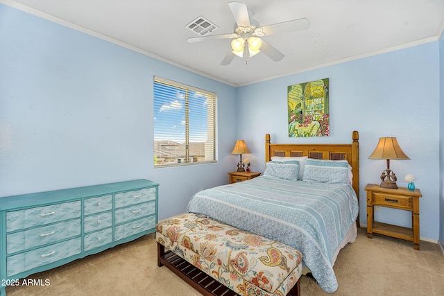 bedroom featuring a ceiling fan, carpet floors, crown molding, and visible vents