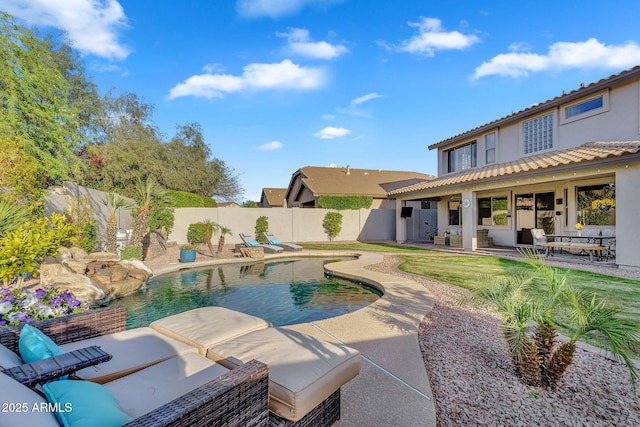 view of swimming pool with a fenced in pool, a fenced backyard, and a patio area