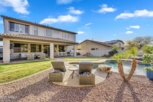 rear view of house featuring a tiled roof, a fenced in pool, a fenced backyard, an outdoor living space, and a patio area
