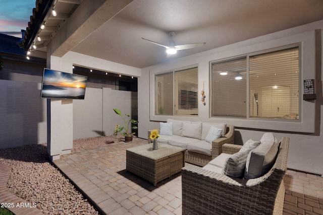 view of patio with an outdoor hangout area and ceiling fan