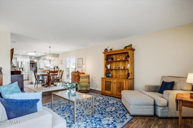2846 E Lupine Ave, Phoenix, AZ 85028 - living room featuring recessed lighting, a notable chandelier, and wood finished floors