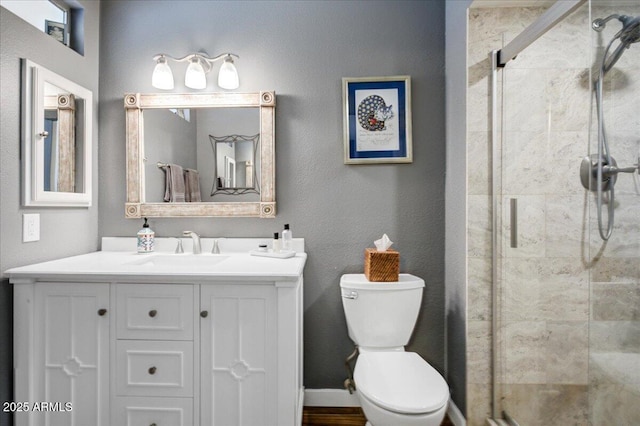 2846 E Lupine Ave, Phoenix, AZ 85028 - full bathroom with vanity, a stall shower, and toilet
